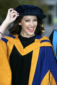 Kylie in her degree robes